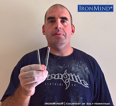 Zsolt Hornyak, a 38-year old systems administrator who lives in Budapest, Hungary, has just been certified on the IronMind Red Nail—a benchmark short steel bend. IronMind® | Image courtesy of Zsolt Hornyak