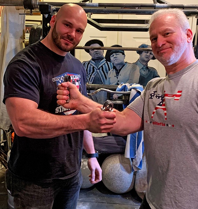 Sal Sabatino (left) has been certified on the Captains of Crush No. 3 gripper, with Steve Weiner, CoC3 ’00, Red Nail, ’04 refereeing Sal’s official attempt to close this legendary gripper. IronMind® | Photo courtesy of Sal Sabatino