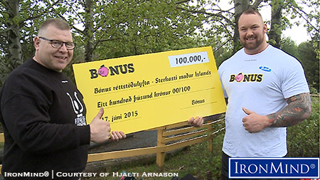 Hjalti Arnason (left) presents the first-place prize to five-time Iceland’s Strongest Man winner Hafthor Julius Bjornsson (right). IronMind® | Courtesy of Hjalti Arnason