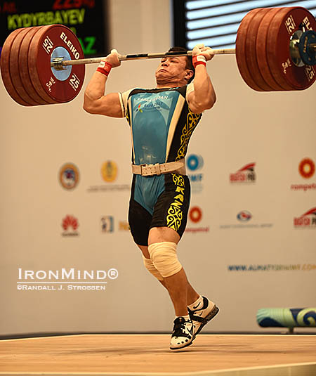 Driving himself under this 229-kg jerk, Zhassulan Kydyrbayev turned silver into gold. IronMind® | Randall J. Strossen photo