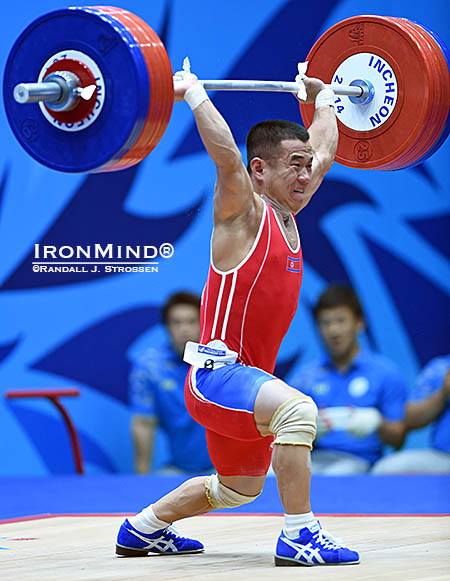 Finishing off the jerk, Om Yun Choi pounded this 170-kg lift, once again showing that triple-bodyweight clean and jerks are familiar territory for him. IronMind® | Randall J. Strossen photo 