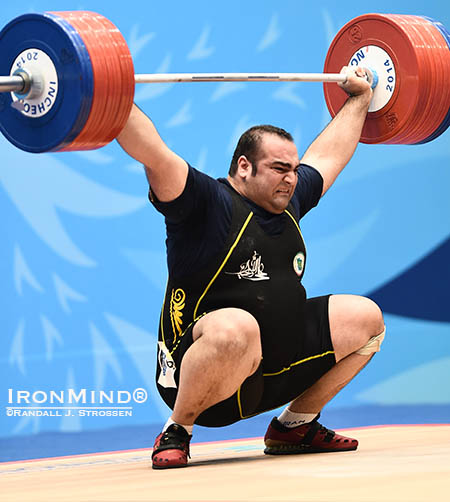 Attacking his own world record in the snatch, Behdad Salimi had 215 kg overhead, but could not fix the bar. IronMind® | Randall J. Strossen photo