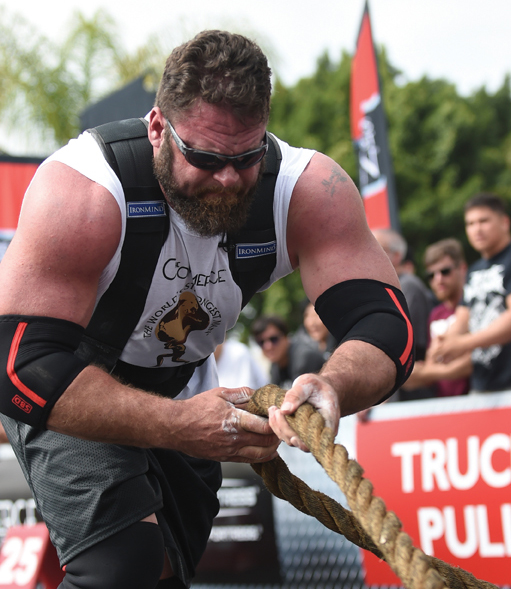 Mike Burke suited up in the Draft Horse Pulling Harness on the Truck Pull at the 2015 World's Strongest Man contest. Randall Strossen photo.