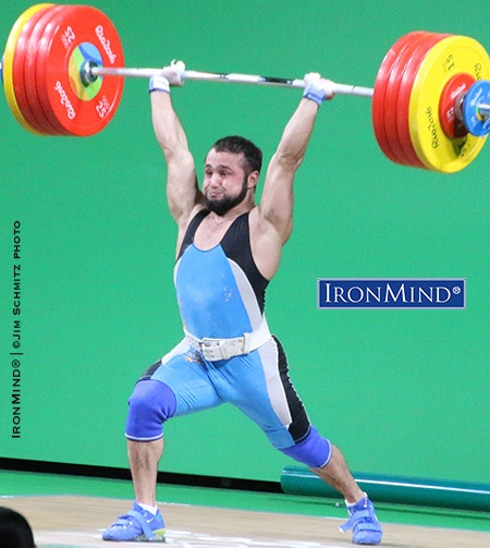 Kazakhstan’s Nijat Rahimov broke a 15-year old world record by 4 kilos in order to win the gold medal in the 7- kg class.    How’s this: a 214-kg world record clean and jerk to win the Olympic gold medal on bodyweight? That’s exactly what Nijat Rahimov did to win the men’s 77-kg category in weightlifting. IronMind® | ©Jim Schmitz photo