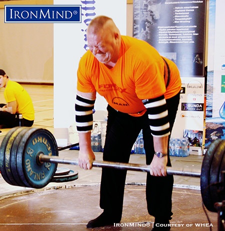 Finnish grip legend Arto Joronen lays it on the IronMind's Apollon's Axle, a benchmark grip strength event, in the 2017 Finnish Championships. IronMind® | Photo courtesy of WHEA.