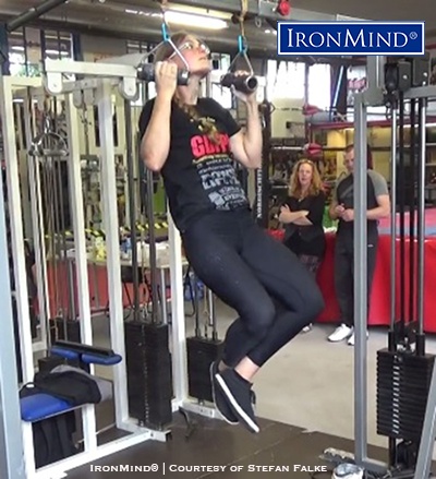 Christiane Schmidt (Germany) sets the inaugural women’s world record for Rolling Thunder pull-ups for reps after knocking off 7 reps at a the German Grip Challenge organized by Stefan Falke ins Hamburg, Germany. IronMind® | Photo courtesy of Stefan Falke