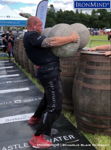 Paul Benton on his way to breaking the world record for loading the Ardblair stones at the IHGF Stones of Strength competition held at the Fettercairn Show (Fettercairn, Scotland). IronMind® | Photo courtesy of Charlie Blair Oliphant