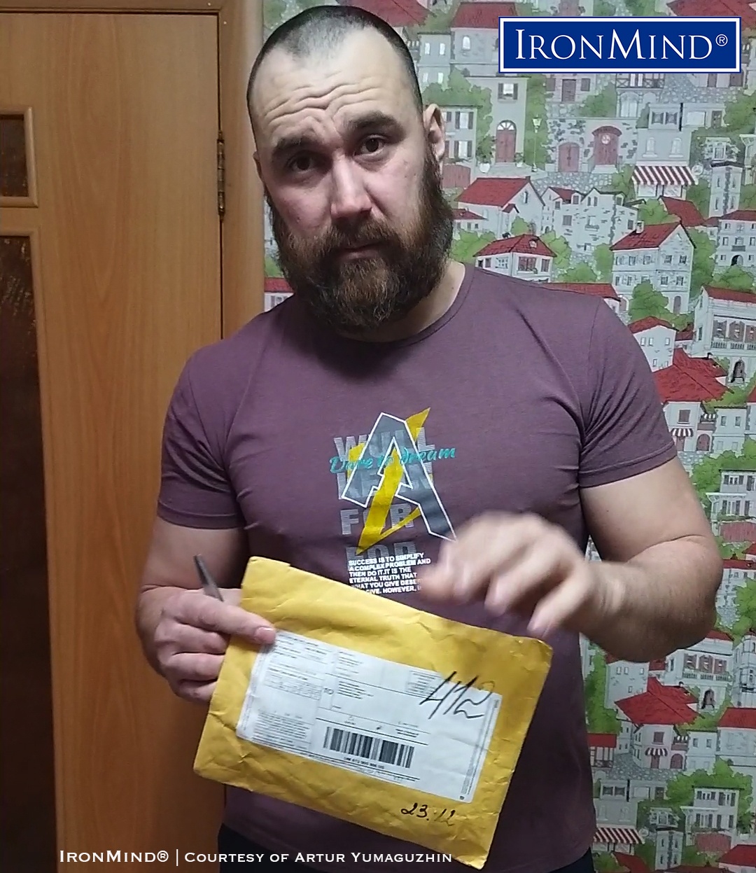 Ready to open the package from IronMind for his official attempt to close a Captains of Crush No. 3 gripper, 34-year old Artur Yumaguzhin (Russia) succeeded and has been certified on the legendary CoC No. 3 gripper. Yumaguzhin, who weighs 110 kg (about 243 lb.) and is 190 cm (about 6’ 3”) tall, works as a mining mechanic. IronMind® | Image courtesy of Artur Yumaguzhin