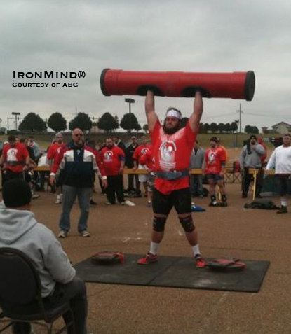 Adam Scherr on the log press.  “Adam is another large human and should do fairly well as a pro strongman,” Dione Wessels said.  IronMind® | Courtesy of ASC.