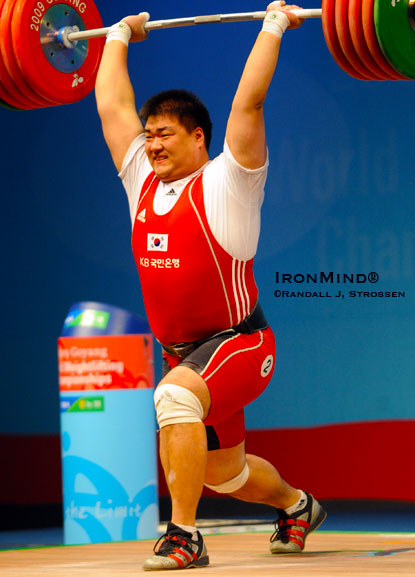 An Yong-Kwon punched this 247-kg jerk overhead to win the supers at the World Weightlifting Championships.  IronMind® | Randall J. Strossen photo.