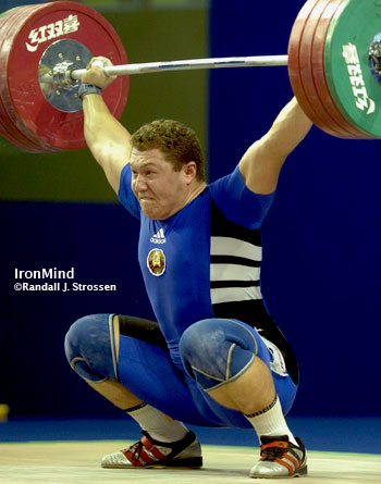 Rock steady, this was the third of six good lifts that Andrei Armanau (Belarus) made in the 105-kg category tonight at the World Weightlifting Championships. This 195-kg snatch, good for the gold medal in the snatch, coupled with his clean and jerks of 225 and 228, gave Aramnau two junior world records in the total. He also won the gold medal in the total. IronMind® | Randall J. Strossen, Ph.D. photo.