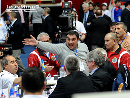 The Armenian team left no doubt about what they thought of Yagci’s medal-winning lift, as they thrust their case on the jury.  IronMind® | Randall J. Strossen photo. 