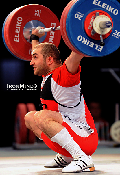 Arsen Kasabijew got off to a rough start, missing 171 kg on his first snatch, but then came back to make this lift on his second attempt, and then he went on to win the gold medals in the clean and jerk, and the total.  IronMind® | Randall J. Strossen photo.