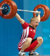 Andrei Rybakou snatches 183 kg, but time had run out and the lift was turned down. IronMind® | Randall J. Strossen, Ph.D. photo.