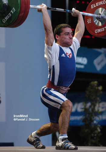 Igor Bour pushed ahead of Vitali Dzerbianiou with his first clean and jerk, and he went on to win the 56-kg category at the European Weightlifting Championships today in Strasbourg. IronMind® | Randall J. Strossen, Ph.D. photo.