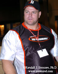 Brad got to relax as his brother Wade let guys test their hand strength at the Gillingham-GNC Grip Gauntlet held at the 2004 Show of Strength (Atlanta, Georgia). IronMind® | Photo by Randall J. Strossen, Ph.D.