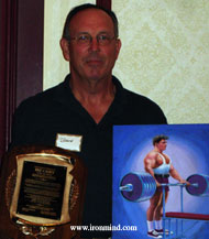 Bruce Wilhelm accepts the award honoring Pat Casey at tonight's AOBS dinner. IronMind® | Randall J. Strossen, Ph.D. photo.