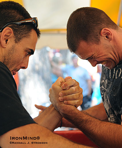 Carlos Garcia (left) and Austin Lockhart (right) battled it out at the Nevada County Fair Arm Wrestling Championships today.  IronMind® | Randall J. Strossen photo.