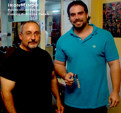 Carlos Fernandez (left) served as the official referee for Carlos F. Rivera Pagan’s certification attempt at the Golden Gym in Dorado, Puerto Rico.  IronMind® | Photo courtesy of Carlos F. Rivera Pagan.