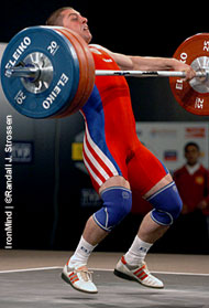 Gevorg Davtyan (Armenia) pulls himself under 165 kg on his third attempt snatch in the 77-kg class at the European Weightlifting Championships today. IronMind® | Randall J. Strossen, Ph.D. photo.
