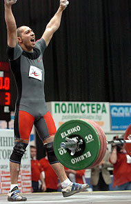 Who's happy? Demir Demirev celebrates his go-ahead 150-kg snatch at the European Weightlifting Championships today. IronMind® | Randall J. Strossen, Ph.D. photo.
