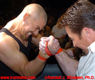 Devin Bair (left) and Vern Martel (right) have at it at the World Wristwrestling Championships, now held in the Boomtown Casino, outside Reno, Nevada. IronMind® | Randall J. Strossen, Ph.D. photo.