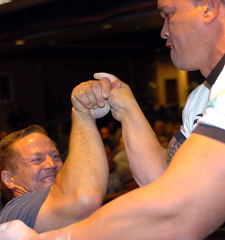 Eric Woelfel (left) and Marcio Barboza (right) going for the glamour title: Men's pro, righthand, 243+. Brazil's Marcio Barboza, the defending Arnold champion, won. IronMind® | Randall J. Strossen, Ph.D. photo.