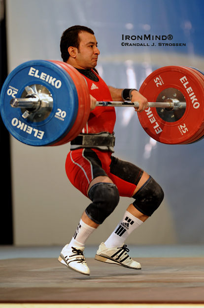 62-kg competitor Erol Bilgin pulls himself under this 165-kg clean and jerk at the European Weightlifting Championships.  IronMind® | Randall J. Strossen photo.