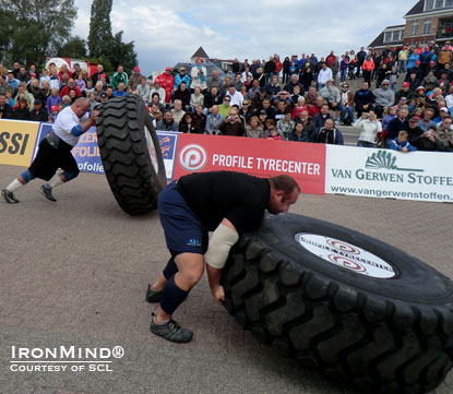 Etienne Smit (bottom) and Konstiantyn Ilin (top) race in the Tire Flip.  IronMind® | Courtesy of SCL.