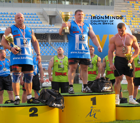 The podium at Giants Live–Poland (left to right): Robert Szczepanksi (third), Vitautas Lalas (winner) and Janusz Kulaga (third).  IronMind® | Photo courtesy of Colin Bryce.