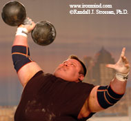 Glenn Ross overwhelms the Inch Dumbbell at the 2005 Arnold Strongman contest. IronMind® | Randall J. Strossen, Ph.D. photo.