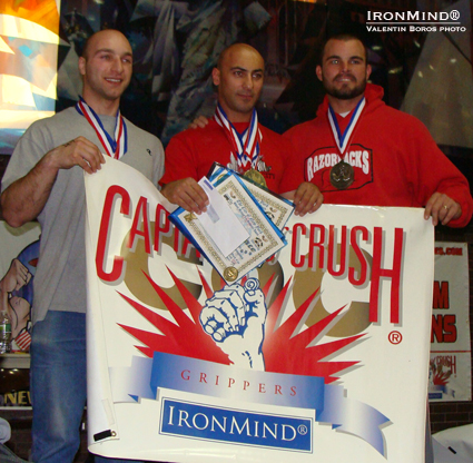 Captains of Crush® Gripper MVP winners at the Empire State Golden Arm Tournament of Champions (left to right): Giorgi  Gelashvili, Roman Tsindeliani, Travis Bagent.  IronMind® | Valentin Boros photo.