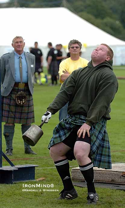 Five-time Canadian national champion Greg Hadley on the 56-lb. weight for height at the 2007 World Highland Games Championships (Inverness, Scotland).  IronMind® | Randall J. Strossen photo.