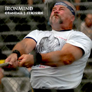 Canadian master competitor Harvey Barkauskas spins toward a world record attempt at the 2004 US/North American Heavy Events Championships (Pleasanton, California). IronMind® | Randall J. Strossen, Ph.D. photo.