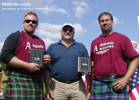 Lead sponsor Steve Smith (center) of Atlantic Windows presents the awards to the winning team of Will Barron (left) and Sean Betz (right).  IronMind® | Photo courtesy of Francis Brebner.