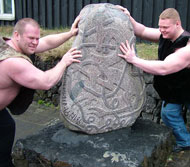 Audunn Jonsson (left) and Benedikt Magnusson (right) will go head to head at the upcoming Icelandic Powerlifting Championships. These modern-day Vikings are no doubt drawing strength from this stone, which displays the language, going back to the third century, that their forebears used. IronMind® | Photo by Hjalti Arnason.