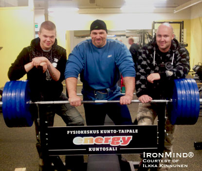 Ilkka Kinnunen - center - is flanked by his training partner Petri Laitenen and gym owner Teemu Karhua after a big bench press workout last week.  A lot of people would consider themselves strong if they could legitimately squat what Kinnunen bench presses raw.  IronMind® | Photo courtesy of Ilkka Kinnunen.
