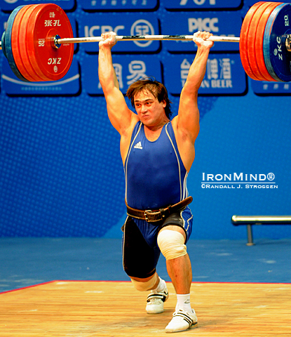 Shown jerking 219 kg at the 2010 Asian Games, defending 94-kg Olympic champion Ilya Ilin (Kazakhstan) has barely been seen on international platforms since his victory in Beijing.  A lot of eyes will on Ilin when he hits the stage in Paris, competing at the World Weightlifting Championships.  IronMind® | Randall J. Strossen photo.