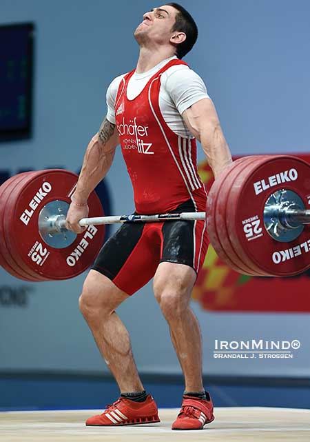 Ivan Markov (Bulgaria) is about to flip the switch and explode on this 175-kg snatch as he delivered a world class performance in the 85-kg class at the 2014 European Weightlifting Championships in Tel Aviv.  IronMind® | Randall J. Strossen photo
