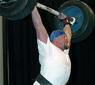 Jesse Marunde, the man who popularized the power jerk on the strongman circuit, sticks 363 pounds on the IronMind® Apollon's Axle™ at the 2005 FitExpo strongman contest (Pasadena, California). IronMind® | Randall J. Strossen, Ph.D. photo.