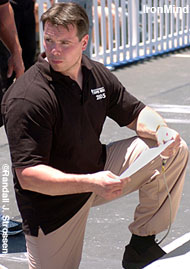 On the job: Jouko Aholo was the head referee at the MET-Rx WSM Super Series contest held at Muscle Beach last year. IronMind® | Randall J. Strossen photo.