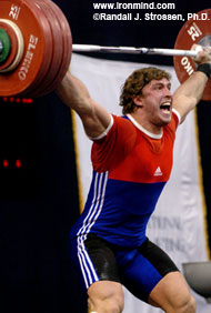 On the way up with the gold medal snatch, 192 kg, Dmitry Klokov lets off a little steam. IronMind® | Randall J. Strossen, Ph.D. photo.