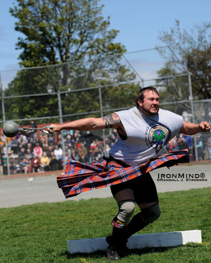 Larry Brock generates major G-forces on the 28-lb. weight for distance at the 2010 IHGF Heavy Events World Championship, where all the competitors were drug tested with negative results, IHGF president David Webster reported to IronMind today.  IronMind® | Randall J. Strossen photo.