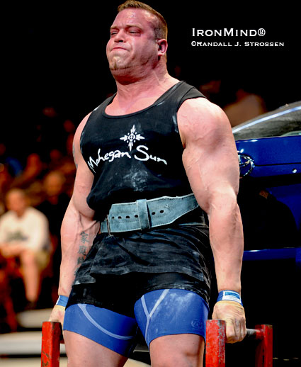 Louis-Philippe Jean, the personable Quebec strongman, bangs away on the car deadlift at the 2009 Giants Live Mohegan Sun Grand Prix.  IronMind® | Randall J. Strossen photo.