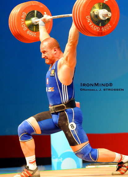 Marcin Dolega hits the 226-kg jerk he needs for gold at the World Weightlifting Championship.  IronMind® | Randall J. Strossen photo.