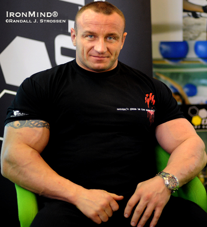 Relaxing in his sponsor’s booth (Olimp Sport Nutrition) at the Salon Body Fitness Expo in Paris, France 10 days ago.  IronMind® | Randall J. Strossen photo.