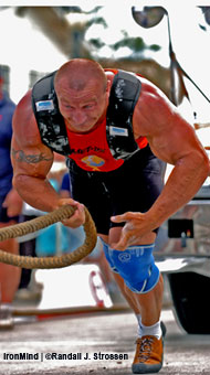 World's Strongest Man began in 1977 and has drawn big names from many corners of the strength world - instead of merely lifting barbells, these big, strong guys did things like pull trucks, lift stones and logs, and carry refrigerators, to the delight of millions of TV viewers worldwide. Mariusz Pudzianowski, shown in the truck pull at the 2004 World's Strongest Man contest, is a three-time winner of this competition - long considered the world championships of strongman - and has to be the favorite for this year's competition.      IronMind® | Randall J. Strossen, Ph.D. photo.