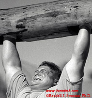 In days of old, when . . . and the log really was . . . Mark Philippi bangs out another rep at the 1997 World's Strongest Man contest (Primm, Nevada). IronMind® | Randall J. Strossen, Ph.D. photo.