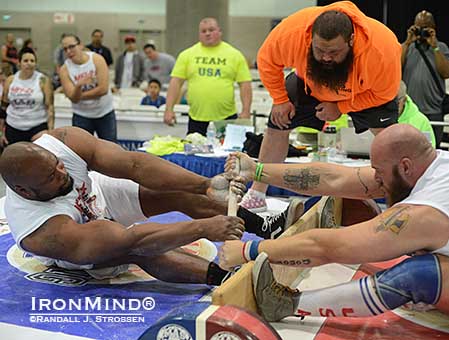 Powered by dotFit, mas wrestling is headed to the Midwest: Mark Felix (left) and Clay Edgin (right) are among the big boys who will plant their feet, grab the still and try to pull the other other guy over the centerboard or rip the stick out of his hands.  IronMind® | Randall J. Strossen photo