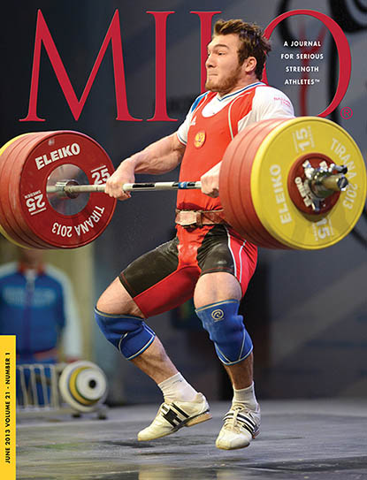 If 2012 Olympic silver medalist Apti Aukhadov (Russia) hasn’t already hit your radar, his performance in Tirana, Albania should make it clear that he’s the man to beat in the 85-kg category.  Shown pulling himself under his 210-kg second attempt clean and jerk, Aukhadov went six for six, won the Best Lifter award, and signaled that he’s capable of breaking the world record in the clean and jerk whenever he feels like it.  IronMind® | Randall J. Strossen photo.